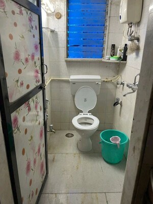 Bathroom in 2 BHK Apartment at Madhav Kunj Apartment, Vile Parle West – for Rent
