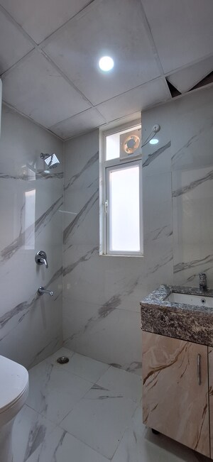 Bathroom in 3.5 BHK Apartment at Smart World Gems, Sector 89 – for Sale