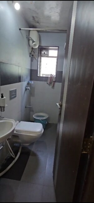 Bathroom in 2 BHK Builder Floor at Chandraprabh CHS, Vile Parle West – for Rent