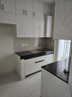 Kitchen in 2 BHK Apartment at Eldeco Live By The Greens, Sector 150 – for Rent