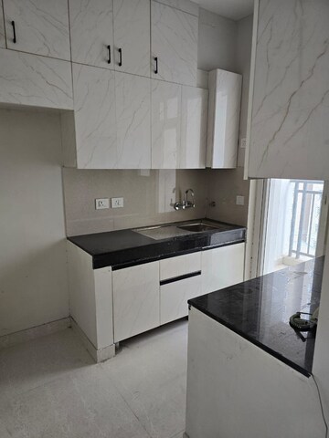 Kitchen in 2 BHK Apartment at Eldeco Live By The Greens, Sector 150 – for Rent