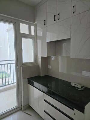 Kitchen in 2 BHK Apartment at Eldeco Live By The Greens, Sector 150 – for Rent