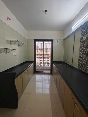 Kitchen in 2 BHK Apartment at Ambika Heights, Nerul – for Rent