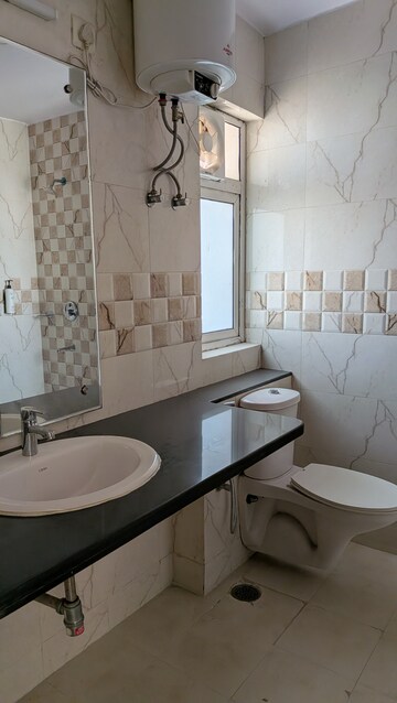 Bathroom in 3 BHK Apartment at Unitech Escape, Sector 50 – for Rent