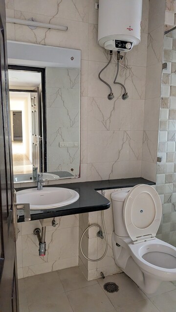 Bathroom in 3 BHK Apartment at Unitech Escape, Sector 50 – for Rent