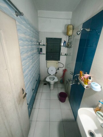 Bathroom in 2 BHK Apartment at Sai Baba Vihar Complex, Ghodbunder Road – for Sale