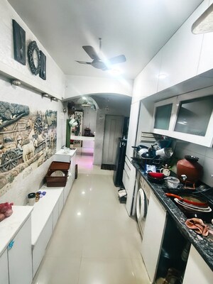 Kitchen in 2 BHK Apartment at Sai Baba Vihar Complex, Ghodbunder Road – for Sale