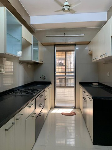 Kitchen in 2 BHK Apartment at Nakshatra Apartments Borivali, Borivali West – for Rent