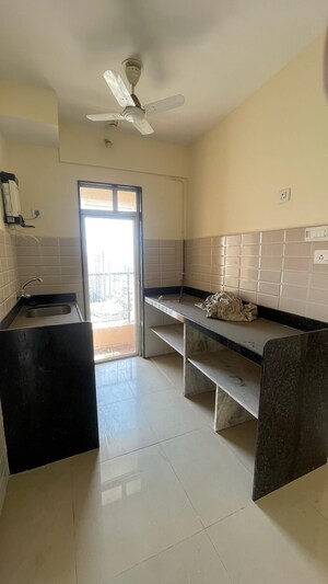 Kitchen in 2 BHK Apartment at JP North Imperia, Mira Road – for Sale