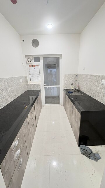 Kitchen in 2 BHK Apartment at Godrej Nurture Pune, Mamurdi – for Rent