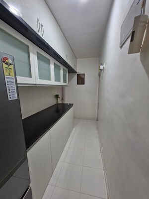 Kitchen in 2 BHK Apartment at Ganga Sarovar, Wadgaon Sheri – for Rent