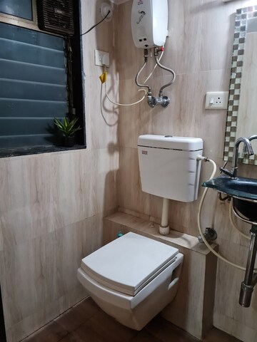Bathroom in 2 BHK Apartment at Hubtown Gardenia, Mira Road – for Rent