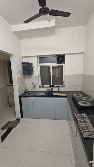 Kitchen in 2 BHK Apartment at Megapolis Serenity, Hinjewadi – for Rent