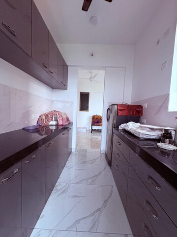 Kitchen in 2 BHK Apartment at Raymond The Address, Pokhran Road No Two – for Rent