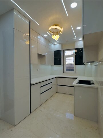 Kitchen in 4 BHK Apartment at Mahavir Enclave 1 – for Sale