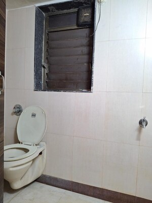 Bathroom in 2 BHK Apartment at Rajanigandha Upvan, Gawand Baug – for Rent