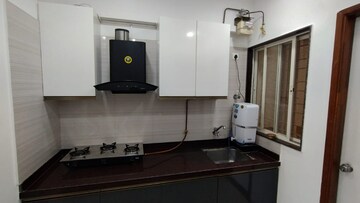 Kitchen in 2 BHK Apartment at Nirman Altius, Kharadi – for Rent