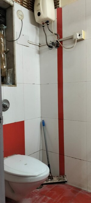 Bathroom in 2.5 BHK Apartment at Ratnakar CHS, Andheri West – for Rent