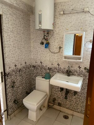 Bathroom in 3 BHK Apartment at Vidyut CGHS, Sector 13 Dwarka – for Rent
