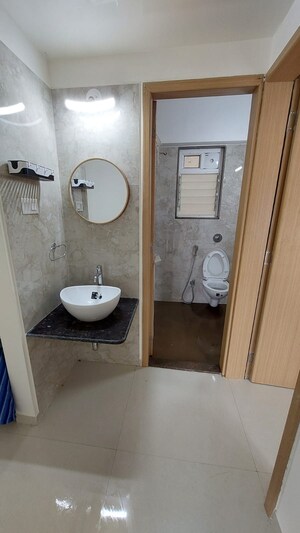 Bathroom in 2 BHK Apartment at Nirman Altius, Kharadi – for Rent