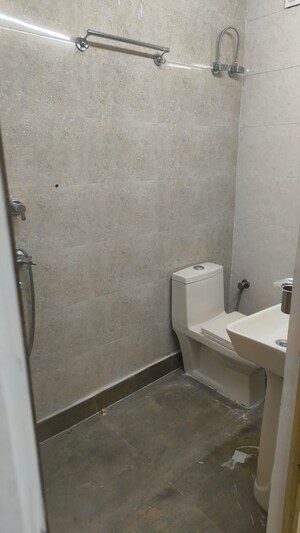 Bathroom in 3 BHK Apartment at Janakpuri – for Rent