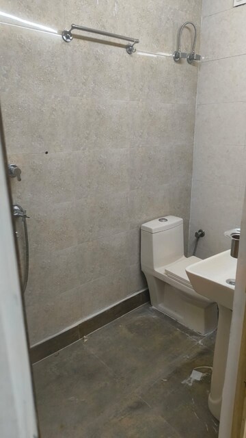 Bathroom in 3 BHK Apartment at Janakpuri – for Rent