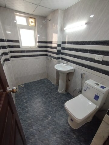 Bathroom in 4 BHK Apartment at Logix Blossom County, Sector 137 – for Rent