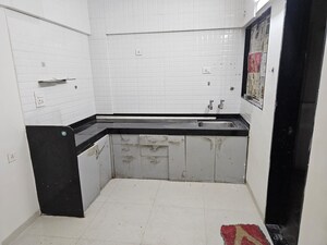 Kitchen in 2 BHK Apartment at Sun Empire, Sinhagad – for Rent