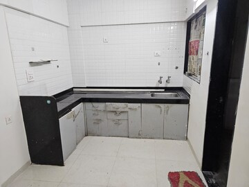 Kitchen in 2 BHK Apartment at Sun Empire, Sinhagad – for Rent