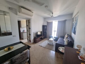 Living Room in 1 BHK Apartment at Hiranandani Zen Maple, Powai – for Rent
