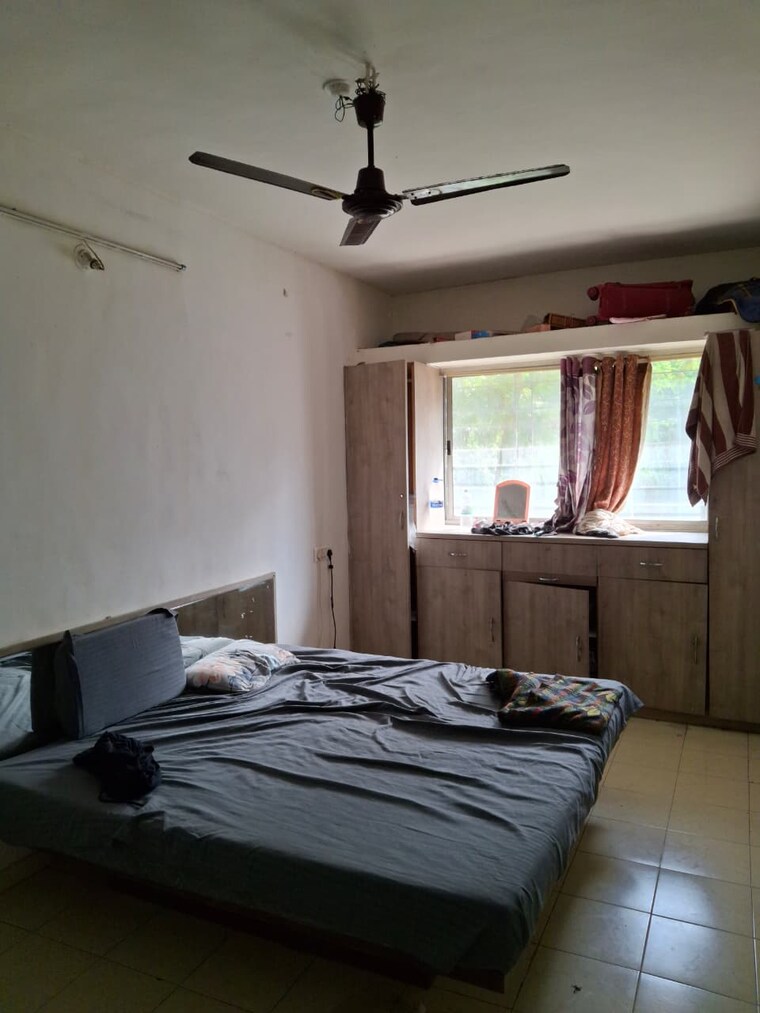 Bedroom, vrindavan-apartments-bhusari-colony 2 Bedroom 900 Sq.Ft. Apartment In Bhusari Colony Pune 9493446
