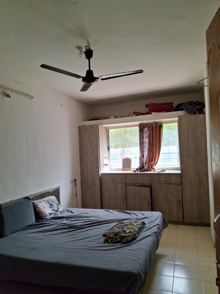 Bedroom, vrindavan-apartments-bhusari-colony 2 Bedroom 900 Sq.Ft. Apartment In Bhusari Colony Pune 9493446