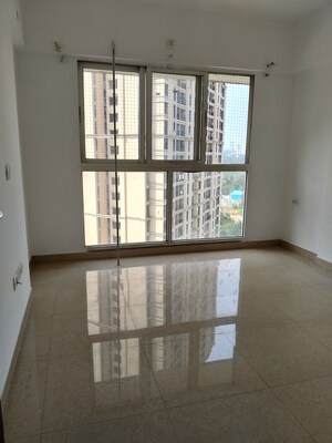 Room in 2 BHK Apartment at Wadhwa Elite, Kolshet Road – for Rent