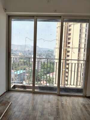 Room in 2 BHK Apartment at The Wadhwa Solitaire, Kolshet Road – for Rent