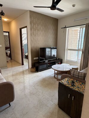 Living Room in 2 BHK Apartment at Lodha Amara, Kolshet Road – for Sale