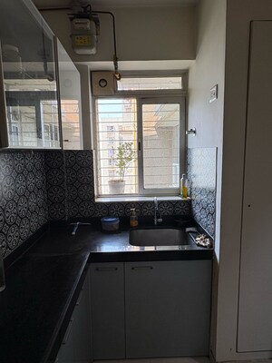 Kitchen in 2 BHK Apartment at Lodha Amara, Kolshet Road – for Sale