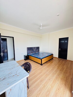 Bedroom in 3.5 BHK Apartment at Aims Golf City, Sector 75 – for Rent