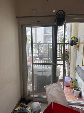 Living Room in 2 BHK Apartment at Antriksh Golf View, Sector 78 – for Rent