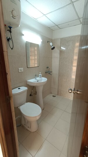 Bathroom in 2 BHK Apartment at Antriksh Golf View, Sector 78 – for Rent