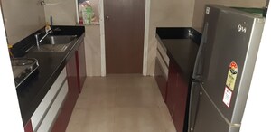Kitchen in 2 BHK Apartment at LnT Crescent Bay T3, Parel – for Sale