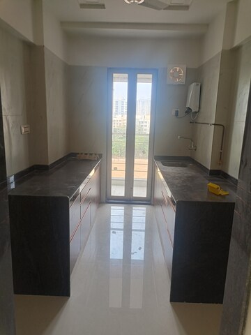 Kitchen in 3 BHK Apartment at Jayesh Shiv Parvati CHS, Kandivali West – for Sale