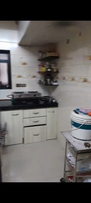 Kitchen in 1 BHK Apartment at Om Shyam Sarjit CHS, Kandivali West – for Sale
