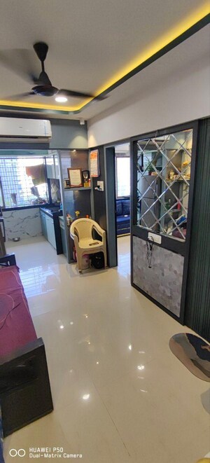 Living Room in 1 BHK Apartment at Tilak Nagar Building, Tilak Nagar – for Sale