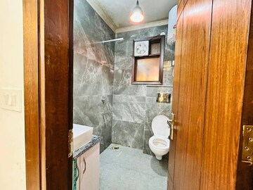 Bathroom in 2 BHK Apartment at Freedom Fighters Enclave – for Rent