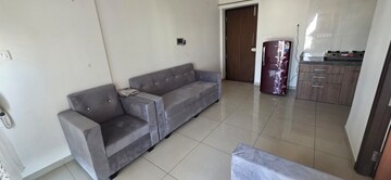 Living Room in 1 BHK Apartment at Duville Riverdale Suites, Kharadi – for Rent