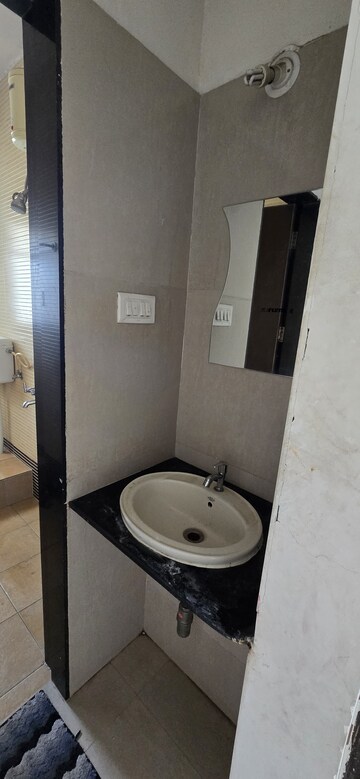 Bathroom in 2 BHK Apartment at Gini Bellissimo, Dhanori – for Rent