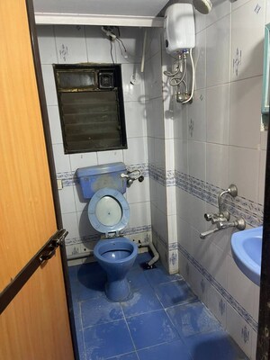 Bathroom in 1 BHK Apartment at Madhuvan Heights, Vasai East – for Rent
