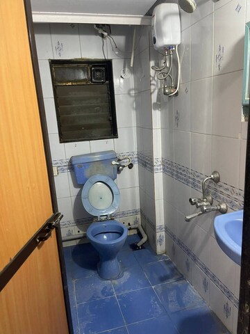 Bathroom in 1 BHK Apartment at Madhuvan Heights, Vasai East – for Rent