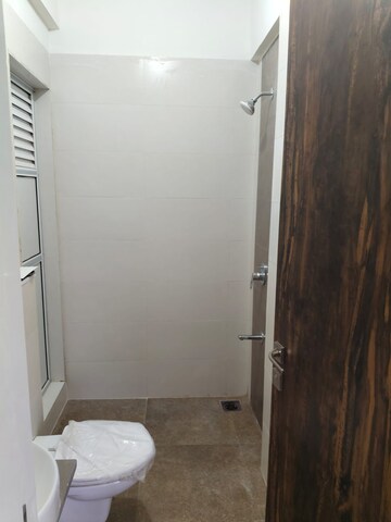 Bathroom in 3 BHK Apartment at Rodas Enclave Evergreen, Patlipada – for Rent
