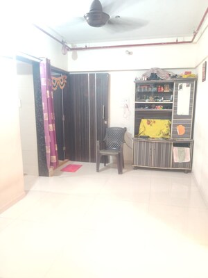 Living Room in 1 BHK Apartment at T.N Lokseva CHS, Tilak Nagar – for Sale